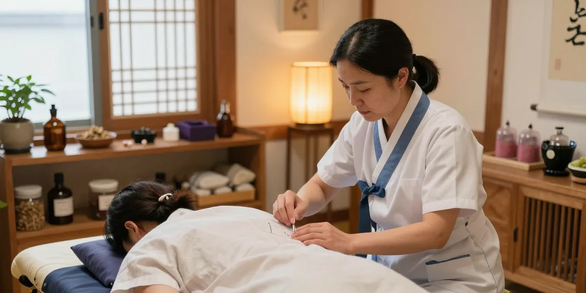 Patient receiving acupuncture at 수원교통사고한의원, showcasing effective treatment for traffic accident recovery.